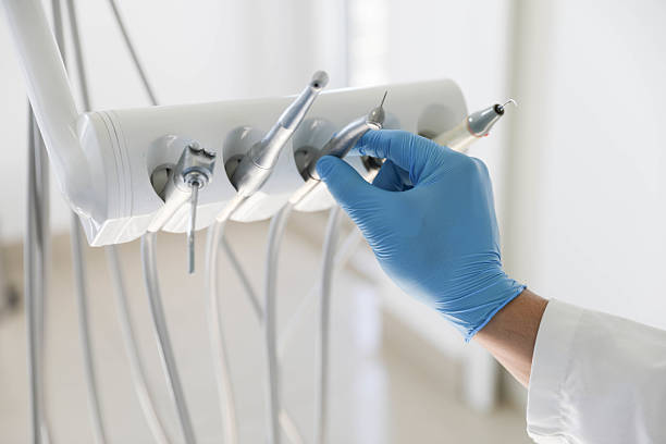 Professional Invisalign Clear Aligners technician working in Sherman, TX